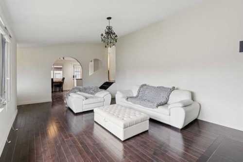 214 Springwood Place Sw, Calgary, AB - Indoor Photo Showing Living Room