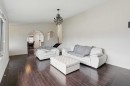 214 Springwood Place Sw, Calgary, AB  - Indoor Photo Showing Living Room 