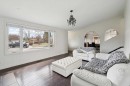 214 Springwood Place Sw, Calgary, AB  - Indoor Photo Showing Living Room 