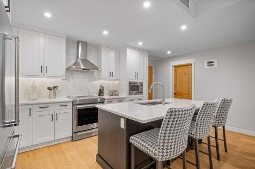205A-1012 Spring Creek Drive, Canmore, AB - Indoor Photo Showing Kitchen With Upgraded Kitchen