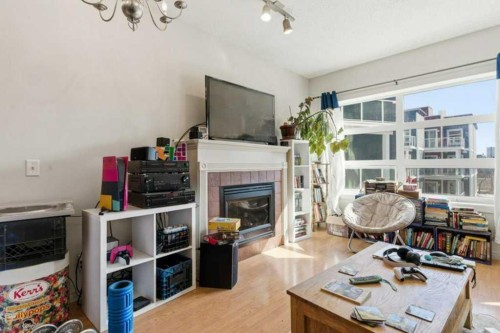 317-333 Riverfront Avenue Se, Calgary, AB - Indoor With Fireplace
