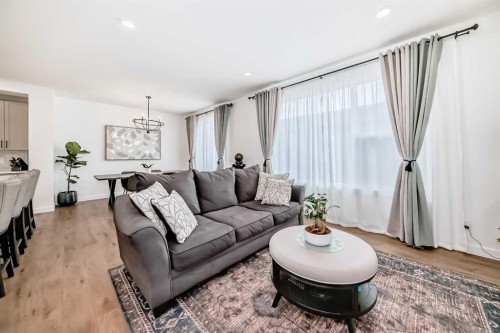 32 Sugarsnap Way Se, Calgary, AB - Indoor Photo Showing Living Room