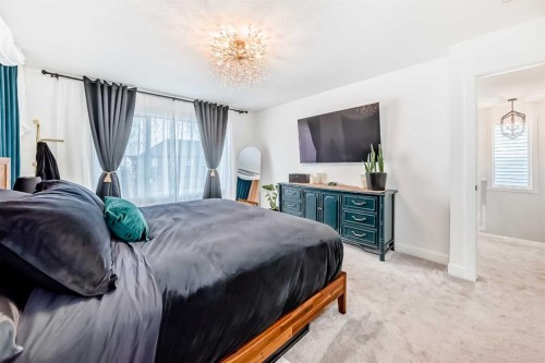 32 Sugarsnap Way Se, Calgary, AB - Indoor Photo Showing Bedroom