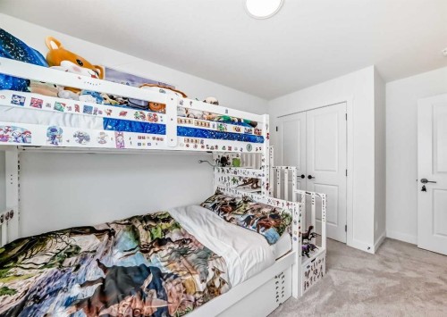 32 Sugarsnap Way Se, Calgary, AB - Indoor Photo Showing Bedroom
