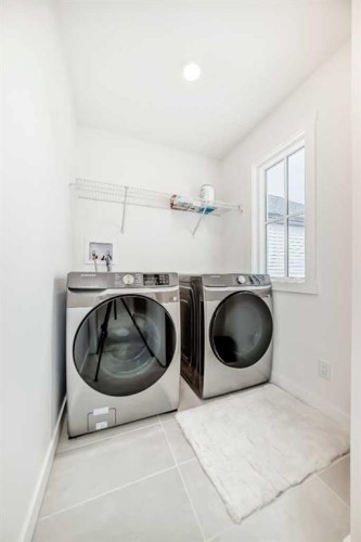32 Sugarsnap Way Se, Calgary, AB - Indoor Photo Showing Laundry Room