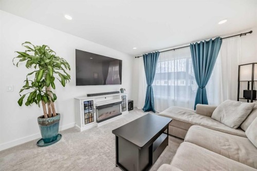 32 Sugarsnap Way Se, Calgary, AB - Indoor Photo Showing Living Room