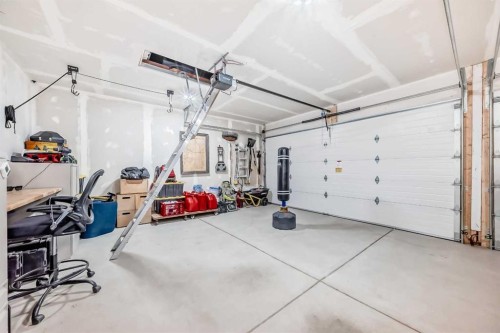 32 Sugarsnap Way Se, Calgary, AB - Indoor Photo Showing Garage
