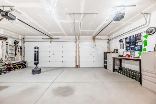 32 Sugarsnap Way Se, Calgary, AB - Indoor Photo Showing Garage