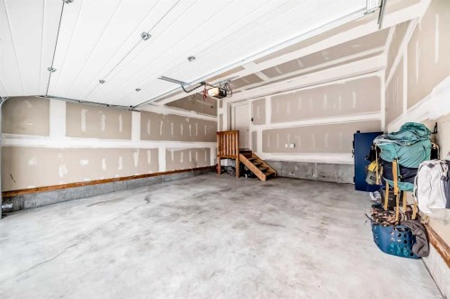 32 Sugarsnap Way Se, Calgary, AB - Indoor Photo Showing Garage
