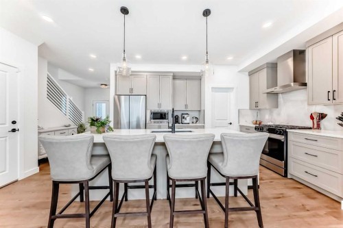 32 Sugarsnap Way Se, Calgary, AB - Indoor Photo Showing Kitchen With Stainless Steel Kitchen With Upgraded Kitchen