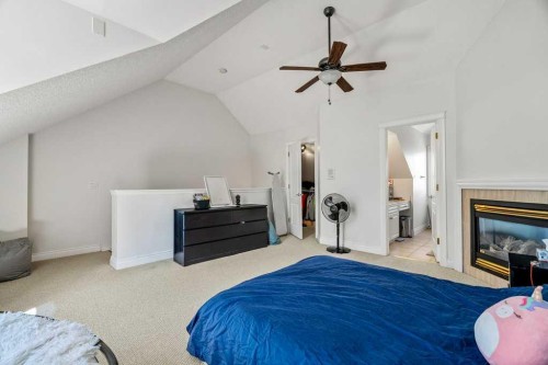 2308 Erlton Place Sw, Calgary, AB - Indoor Photo Showing Bedroom With Fireplace