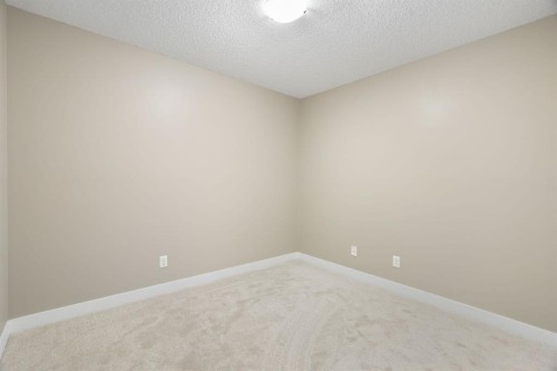 1315-81 Legacy Boulevard Se, Calgary, AB - Indoor Photo Showing Other Room