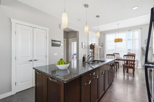 42 Sage Hill Green Nw, Calgary, AB - Indoor Photo Showing Kitchen With Double Sink With Upgraded Kitchen