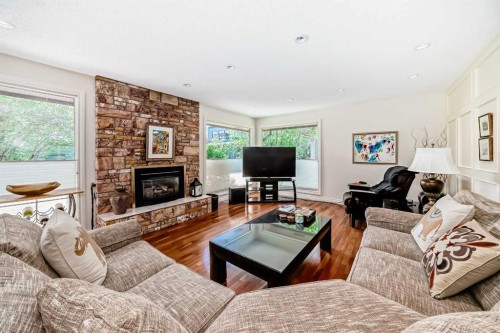 123 Varsity Estates Grove Nw, Calgary, AB - Indoor Photo Showing Living Room With Fireplace