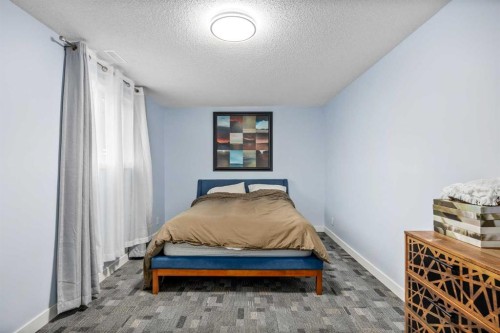 1305 10 Avenue Se, High River, AB - Indoor Photo Showing Bedroom
