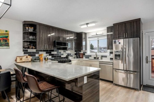 1305 10 Avenue Se, High River, AB - Indoor Photo Showing Kitchen With Stainless Steel Kitchen