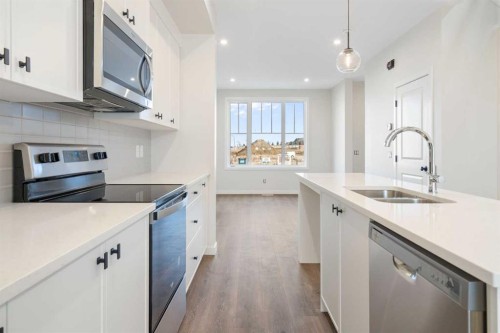 1457 Rangeview Drive Se, Calgary, AB - Indoor Photo Showing Kitchen With Double Sink With Upgraded Kitchen