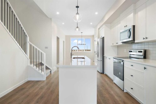 1457 Rangeview Drive Se, Calgary, AB - Indoor Photo Showing Kitchen With Upgraded Kitchen
