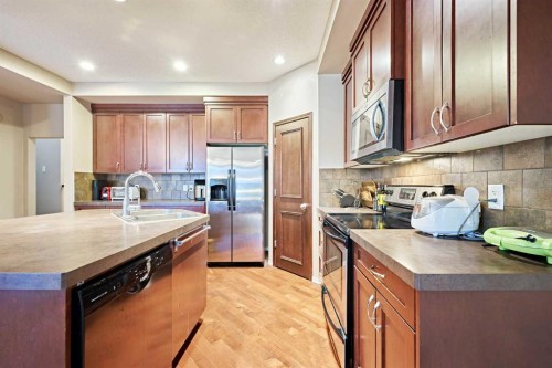 789 Panatella Boulevard Nw, Calgary, AB - Indoor Photo Showing Kitchen
