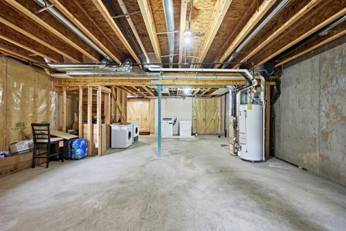 789 Panatella Boulevard Nw, Calgary, AB - Indoor Photo Showing Basement