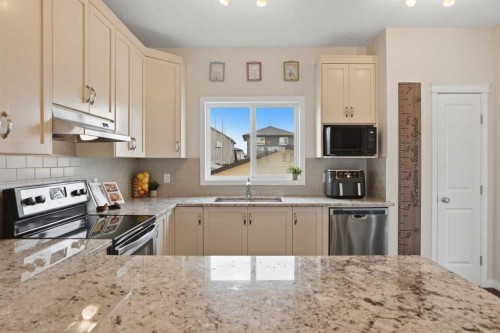 2116 Reunion Square Nw, Airdrie, AB - Indoor Photo Showing Kitchen With Stainless Steel Kitchen