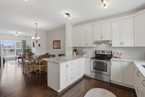 2116 Reunion Square Nw, Airdrie, AB - Indoor Photo Showing Kitchen