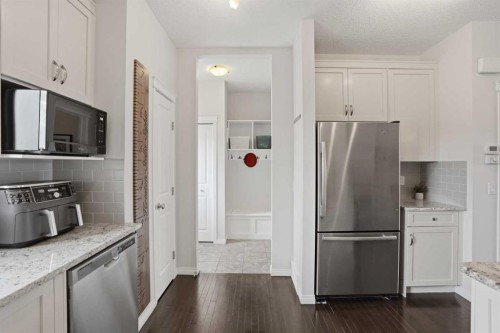 2116 Reunion Square Nw, Airdrie, AB - Indoor Photo Showing Kitchen With Stainless Steel Kitchen