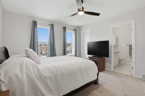 2116 Reunion Square Nw, Airdrie, AB - Indoor Photo Showing Bedroom