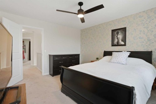2116 Reunion Square Nw, Airdrie, AB - Indoor Photo Showing Bedroom