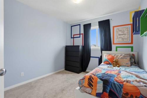 2116 Reunion Square Nw, Airdrie, AB - Indoor Photo Showing Bedroom