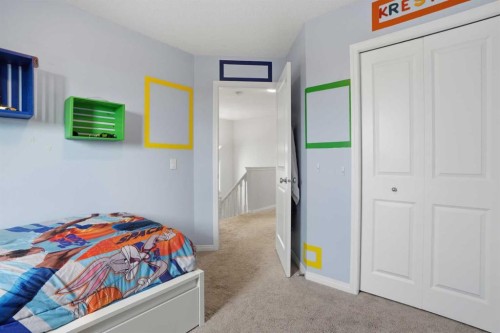 2116 Reunion Square Nw, Airdrie, AB - Indoor Photo Showing Bedroom