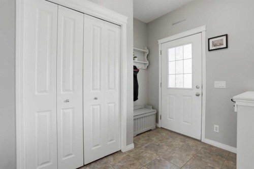 2116 Reunion Square Nw, Airdrie, AB - Indoor Photo Showing Living Room With Fireplace