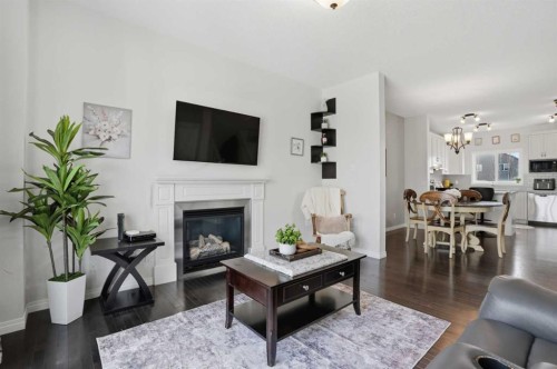 2116 Reunion Square Nw, Airdrie, AB - Indoor Photo Showing Living Room With Fireplace