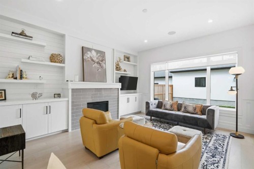 1256 Rosehill Drive Nw, Calgary, AB - Indoor Photo Showing Living Room With Fireplace
