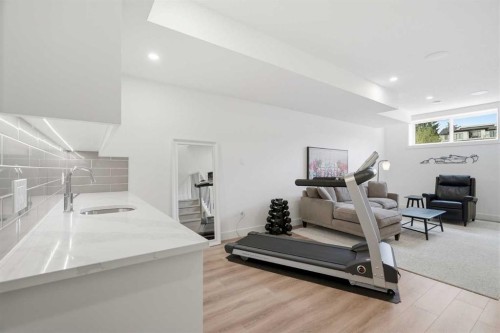 1256 Rosehill Drive Nw, Calgary, AB - Indoor Photo Showing Gym Room