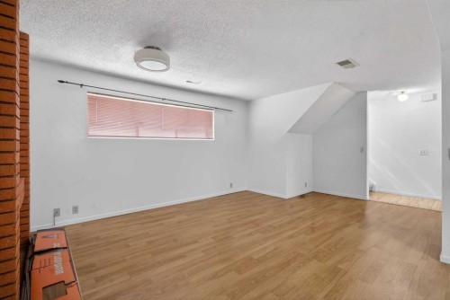 900 Abbeydale Drive Ne, Calgary, AB - Indoor Photo Showing Other Room