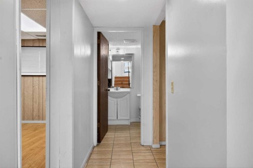 900 Abbeydale Drive Ne, Calgary, AB - Indoor Photo Showing Other Room