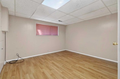 900 Abbeydale Drive Ne, Calgary, AB - Indoor Photo Showing Other Room