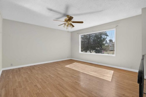 900 Abbeydale Drive Ne, Calgary, AB - Indoor Photo Showing Other Room