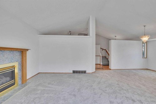 90 Martinridge Crescent Ne, Calgary, AB - Indoor With Fireplace
