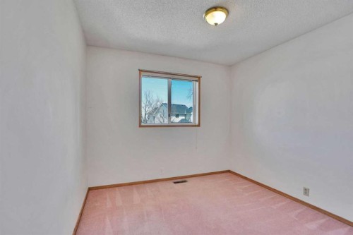 90 Martinridge Crescent Ne, Calgary, AB - Indoor Photo Showing Other Room