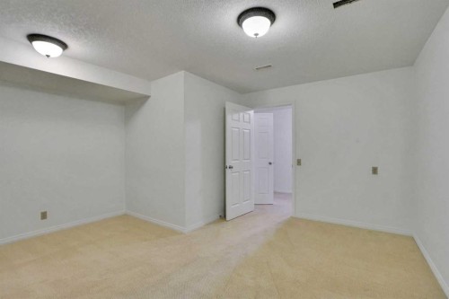 90 Martinridge Crescent Ne, Calgary, AB - Indoor Photo Showing Other Room