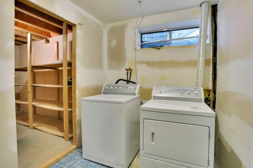 90 Martinridge Crescent Ne, Calgary, AB - Indoor Photo Showing Laundry Room
