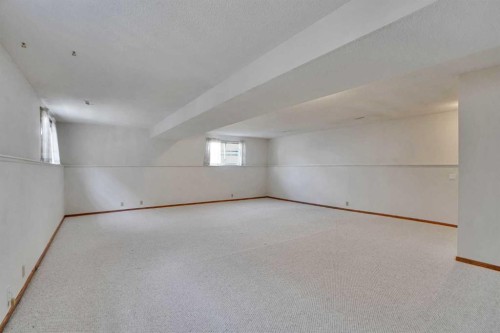 90 Martinridge Crescent Ne, Calgary, AB - Indoor Photo Showing Other Room