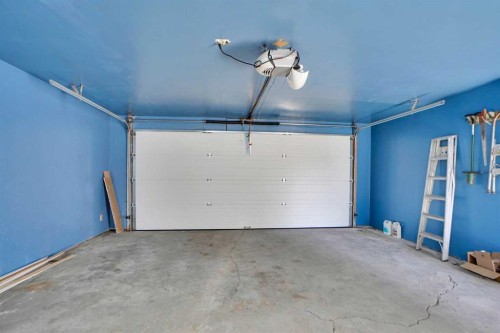 90 Martinridge Crescent Ne, Calgary, AB - Indoor Photo Showing Garage
