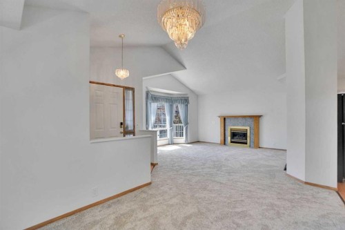 90 Martinridge Crescent Ne, Calgary, AB - Indoor With Fireplace