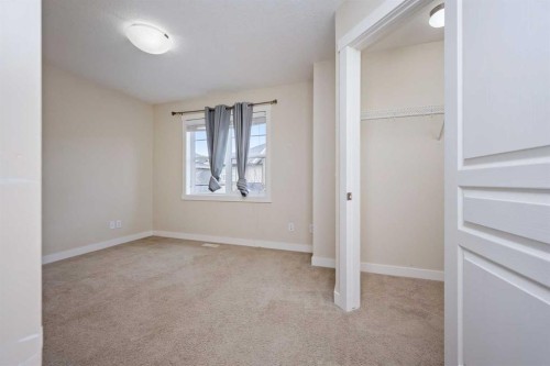 211 Mckenzie Towne Square Se, Calgary, AB - Indoor Photo Showing Other Room