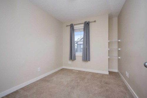 211 Mckenzie Towne Square Se, Calgary, AB - Indoor Photo Showing Other Room