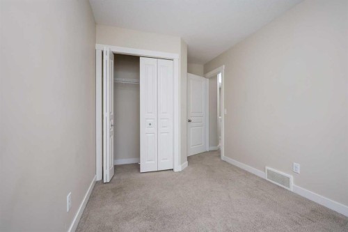 211 Mckenzie Towne Square Se, Calgary, AB - Indoor Photo Showing Other Room