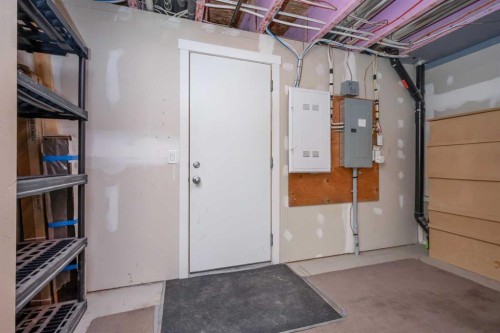 211 Mckenzie Towne Square Se, Calgary, AB - Indoor Photo Showing Garage